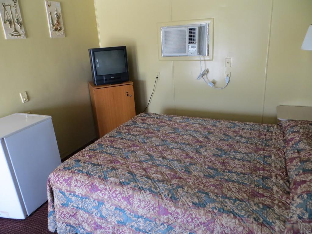 Travelers Inn Окічобі Номер фото